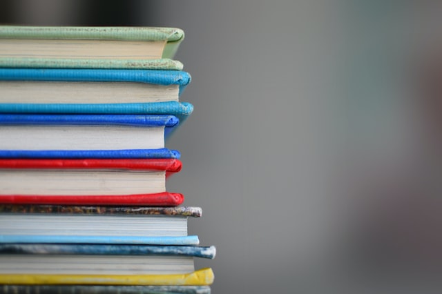 Image of books in various colours